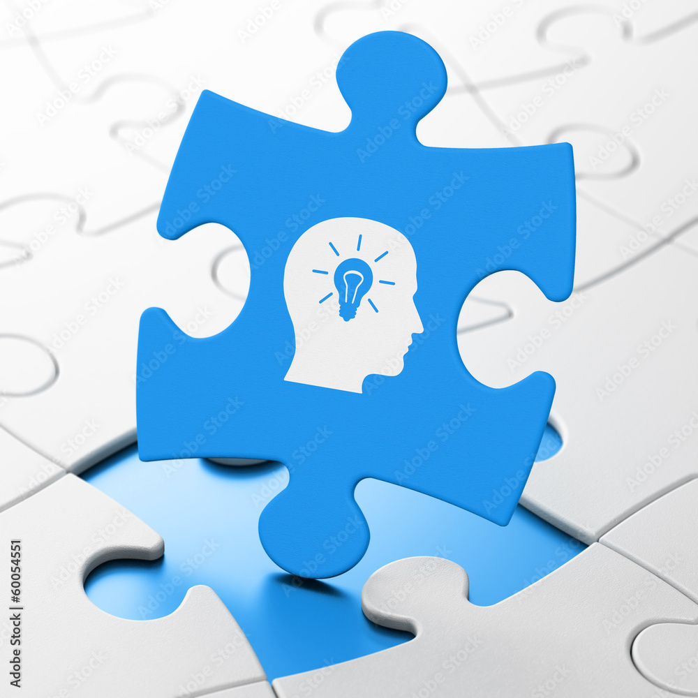 Marketing concept: Head With Light Bulb on puzzle background Marketing concept: Head With Light Bulb on puzzle background