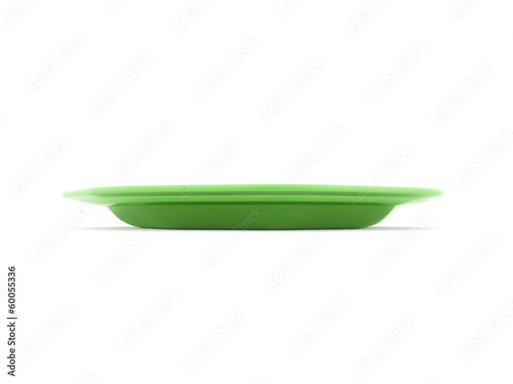 Green plate isolated on white Green plate isolated on white