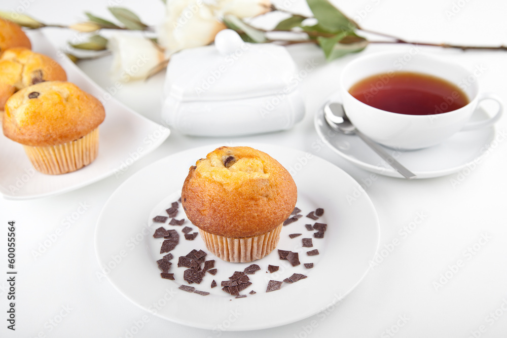 Muffins mit einer Tasse Tee Muffins mit einer Tasse Tee
