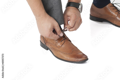 tying shoelaces