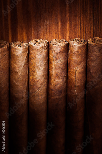 Photography cigars on wooden background