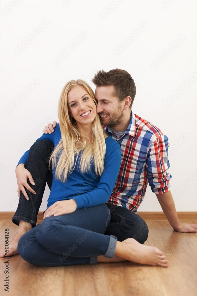 Happy couple flirting together at home Happy couple flirting together at home