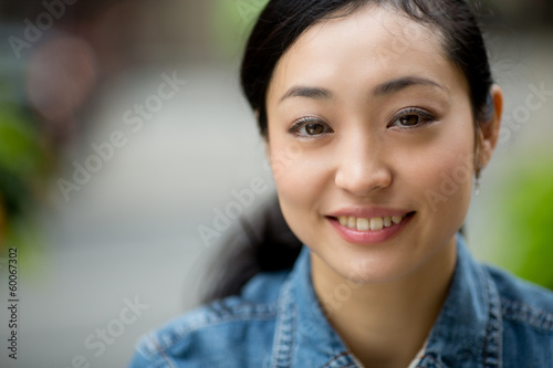 Obraz na plátně Asian casual woman in New York City smiling face