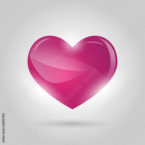 glowing heart on gray background