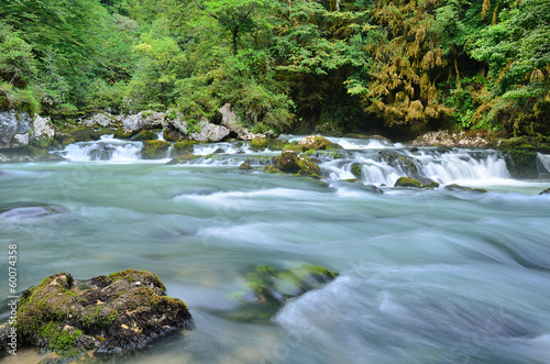 small waterfall on the mountain river