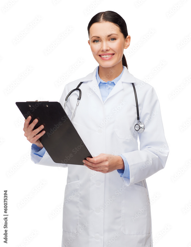 smiling female doctor with clipboard smiling female doctor with clipboard