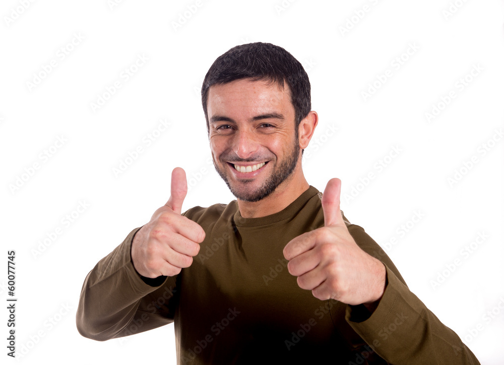 Happy attractive man giving thumbs up Happy attractive man giving thumbs up