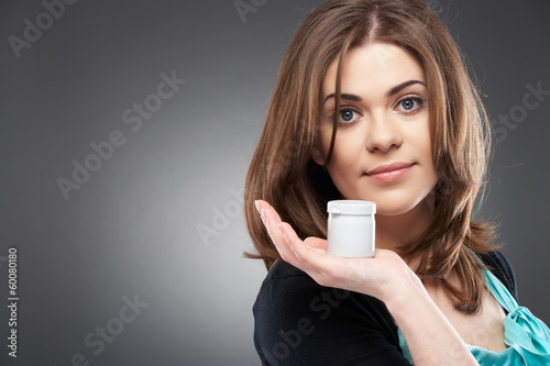 Young smiling woman with cream