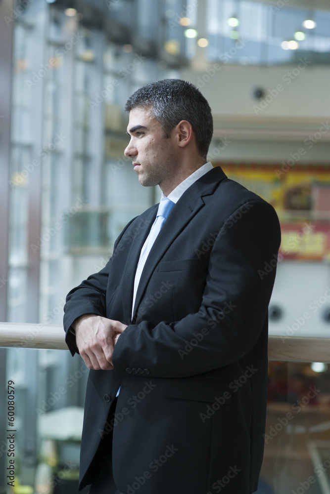 Businessman with serious expression looking off camera Businessman with serious expression looking off camera