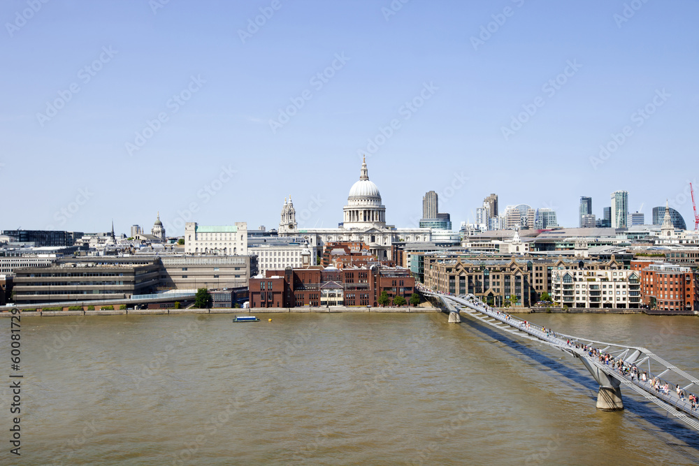 View of Millennium Bridge with view of City of London in the Background