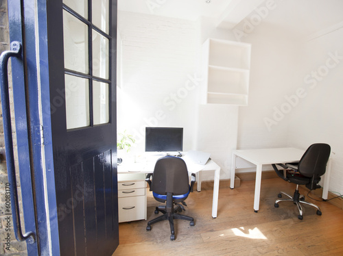 Empty office with chairs and tables