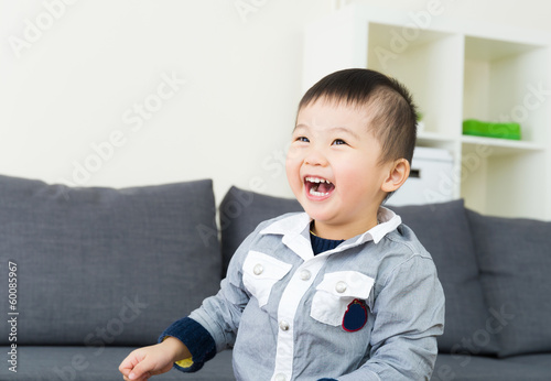 Asian little boy giggle
