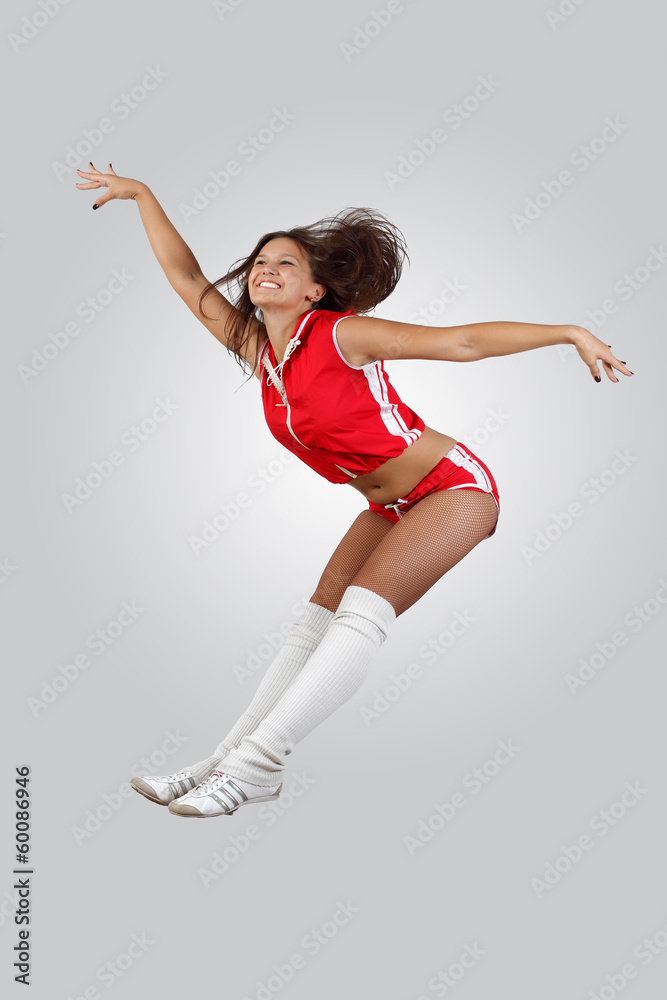 © Sergey Nivens - Young female dancer against white background