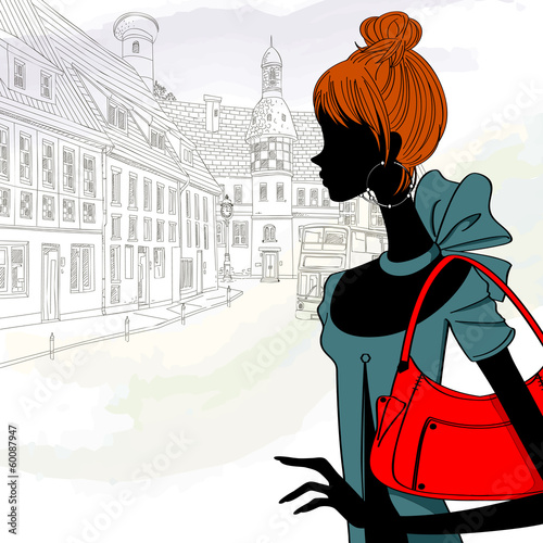beautiful woman carrying a shoulder bag