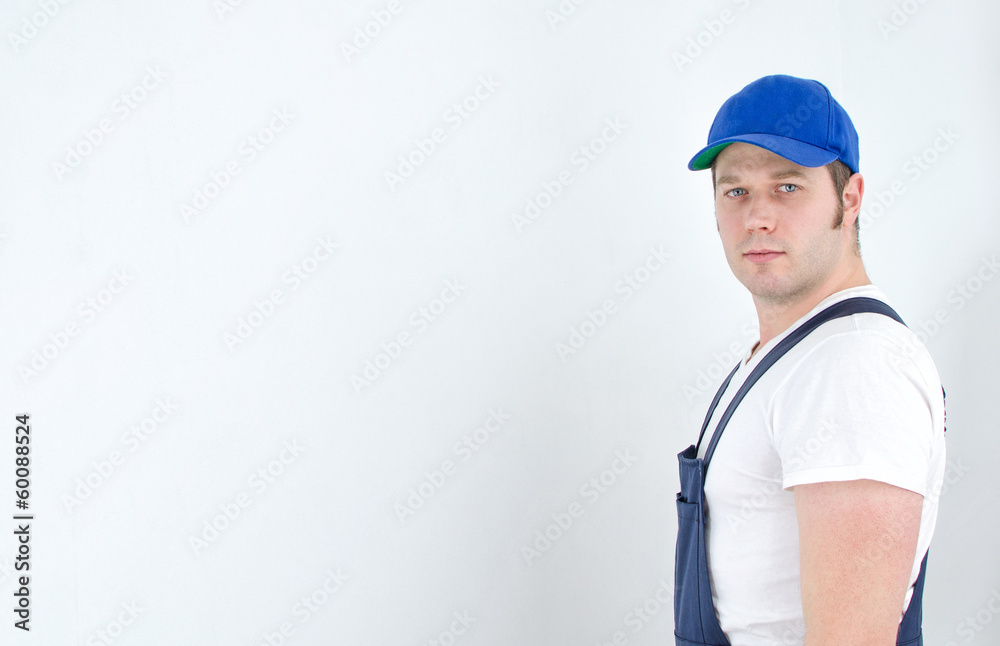 Tradesman in uniform. Space for your text. Tradesman in uniform. Space for your text.