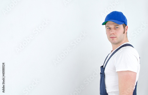 Tradesman in uniform. Space for your text.