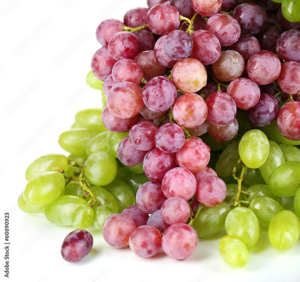 Ripe green and purple grapes isolated on white