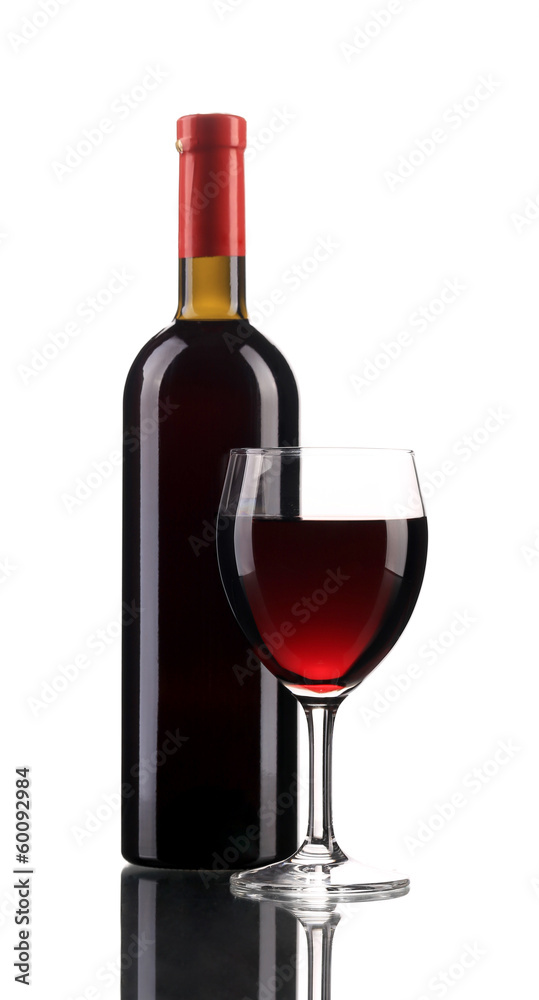 Close up of glass and wine bottle. Close up of glass and wine bottle.