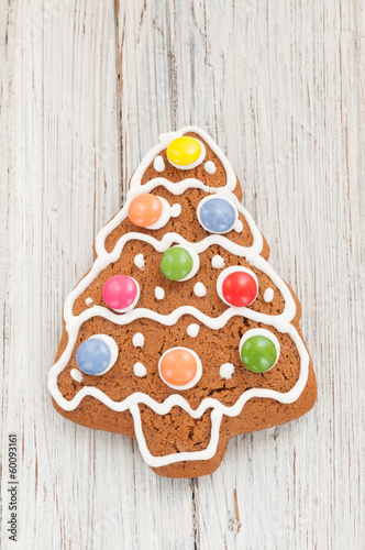 Christmas gingerbread tree on wooden background