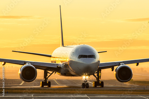 Airplane at sunset