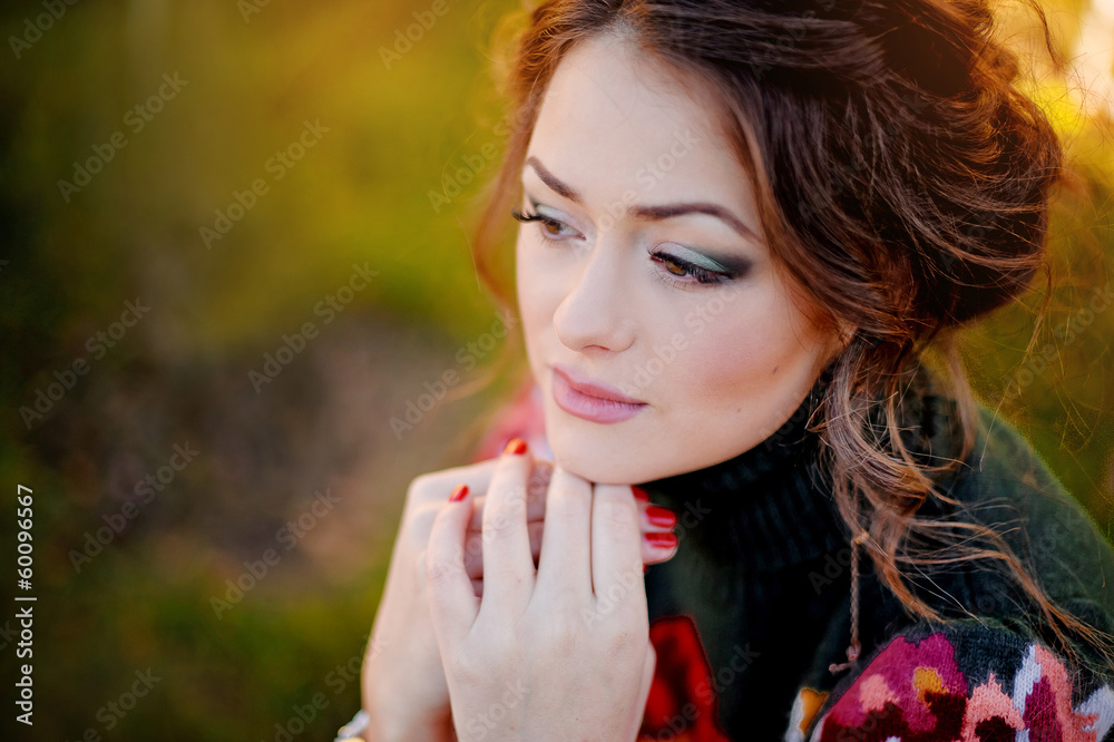 Obraz premium portrait of beautiful girl on nature background