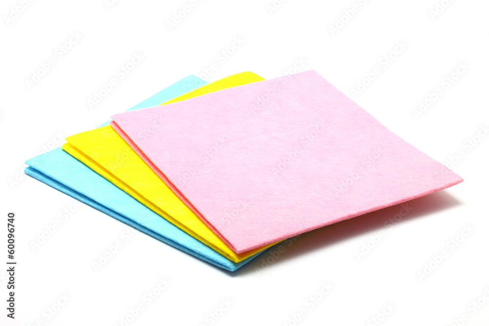 Multi colored cleaning cloths isolated on white background Multi colored cleaning cloths isolated on white background