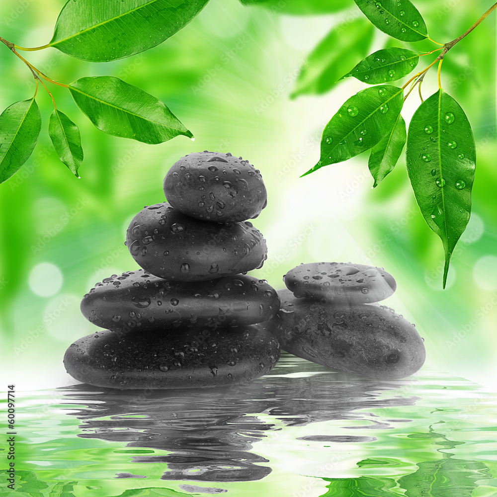 spa Background - black stones and bamboo on water spa Background - black stones and bamboo on water