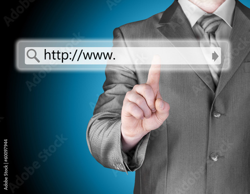 Businessman pushing virtual search bar