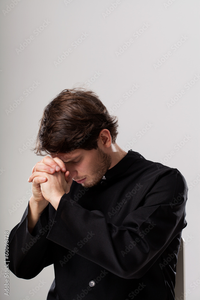 Priest meditating Priest meditating