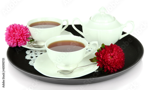 Cups of tea on tray isolated on white