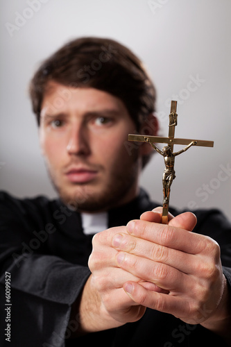 Photography Exorcist with crucifix