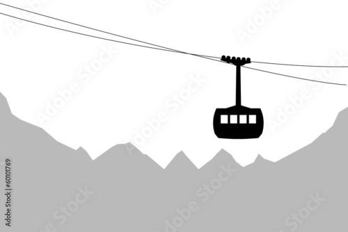 Cabin cableway with mountains in background