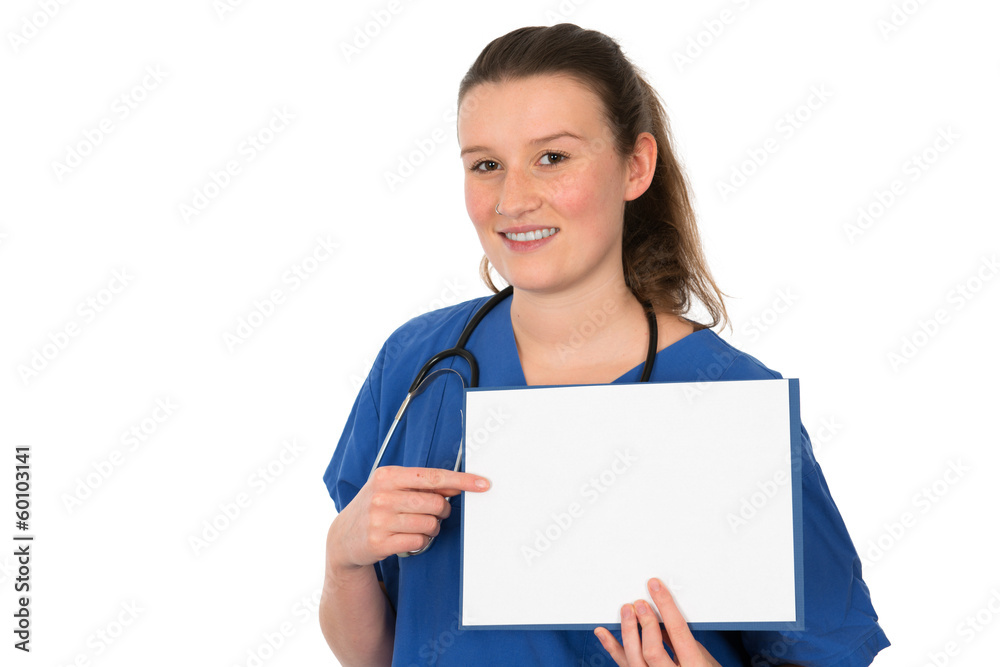 young female doctor is pointing to white signboard young female doctor is pointing to white signboard