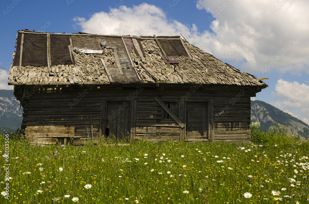 Traditional wooden house in mountains Traditional wooden house in mountains