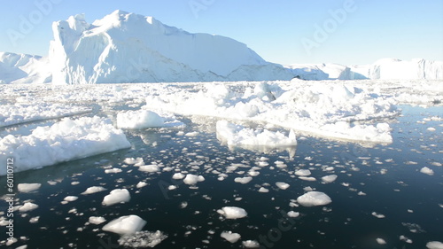 Driving through ice in arctic waters photo