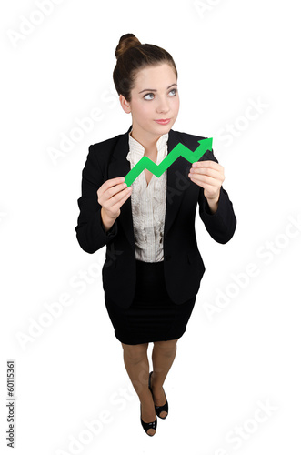 Obraz na płótnie Elegant business woman with arrow dressed in formal attire w salonie