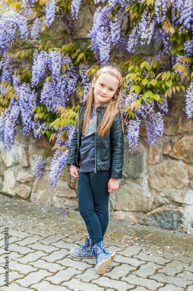 Spring portrait of a cute little girl