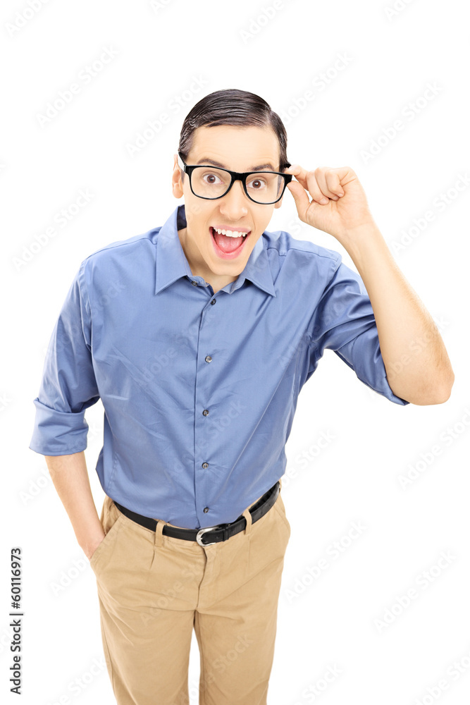 Smiling young man with glasses looking at camera Smiling young man with glasses looking at camera