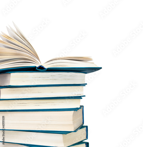 Detail of a pile of books on a white background