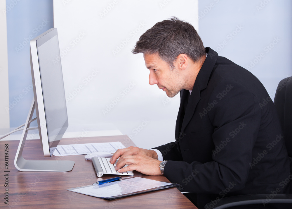 Businessman Using Computer Businessman Using Computer