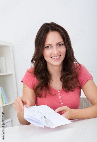 Happy Woman Holding Paper