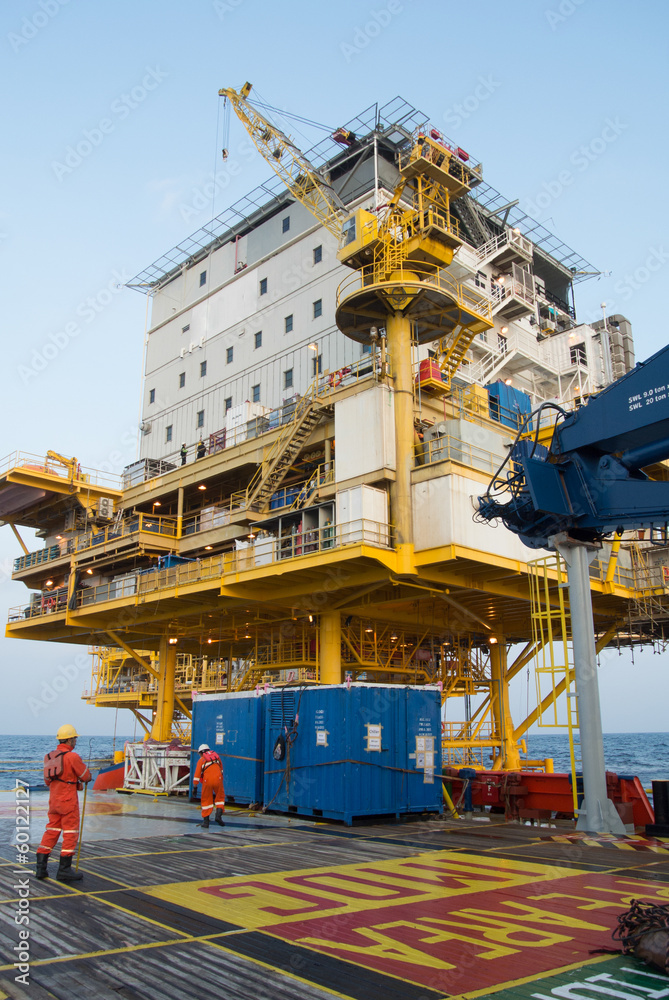 Fototapeta premium supply boat standby for lift cargo