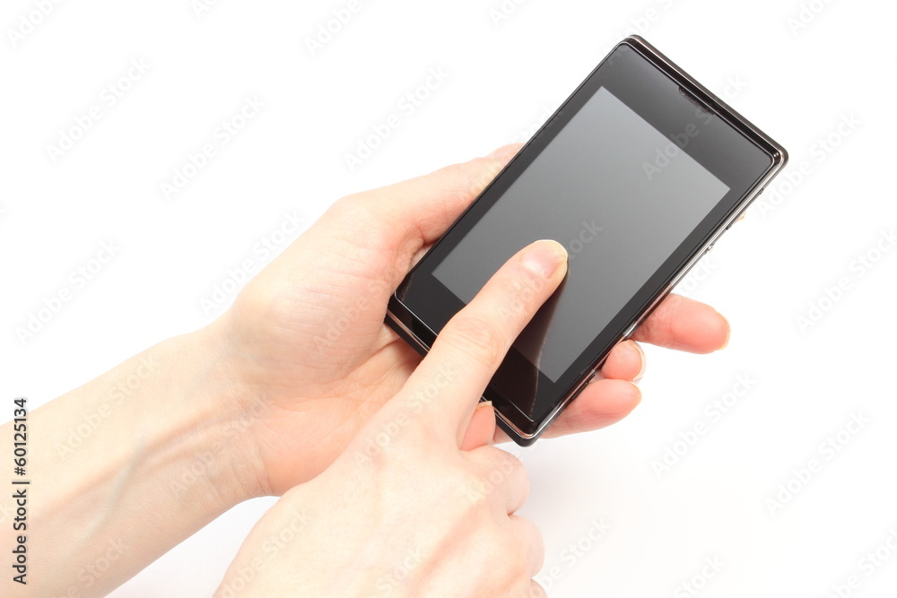 Hand of woman holding mobile phone and touching blank screen Hand of woman holding mobile phone and touching blank screen
