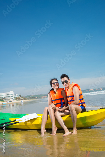 Couple in the boat © DragonImages