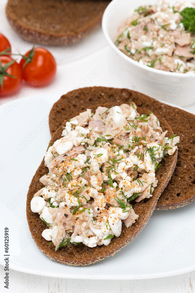 rye bread with tuna, homemade cheese and dill, vertical rye bread with tuna, homemade cheese and dill, vertical