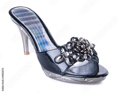 shoe. woman sandal on a background