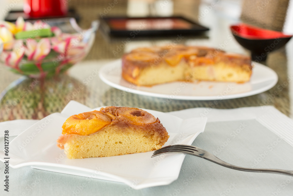 Slice of plum cake on serving plate Slice of plum cake on serving plate