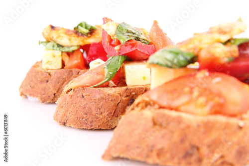 Sandwiches with chicken, tomato, cheese and bell pepper