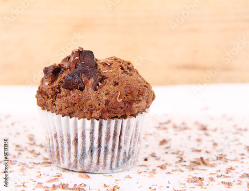 Lemon muffin on a wooden background