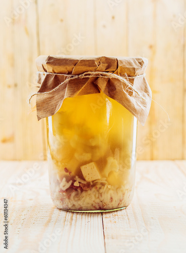 Bottle of traditional festive German soup photo